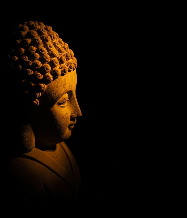 Ancient scroll with glowing symbols representing yoga philosophy.